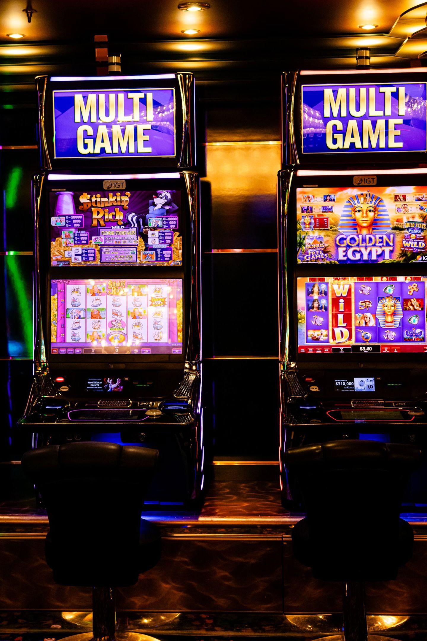 Colorful multi-game slot machines inside a li