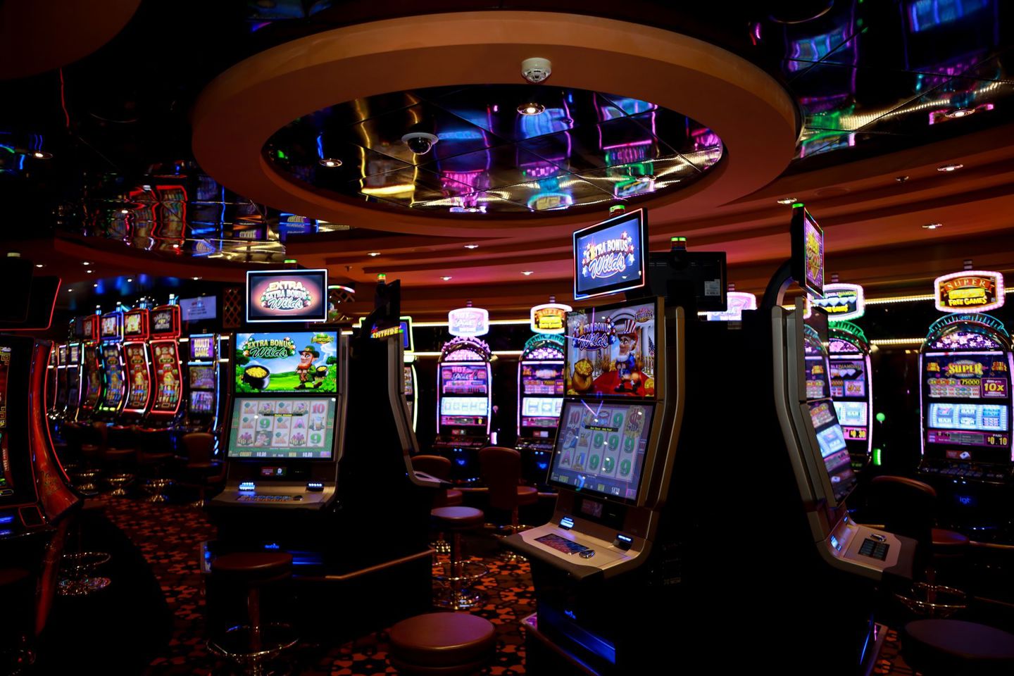 Vibrant casino floor with colorful slot machi