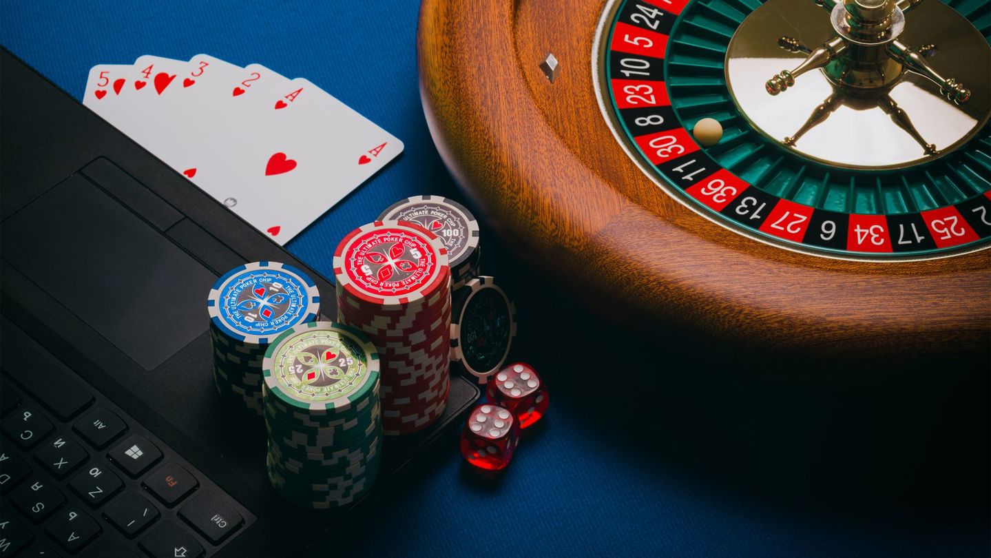Close-up of a roulette table, poker chips, an
