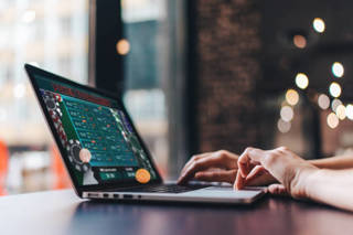 girl-using-her-laptop-for-taking-part-in-onli