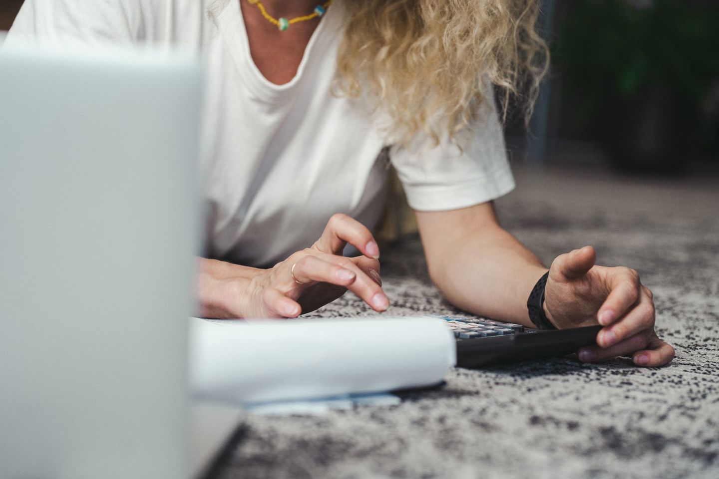 A woman engages in budget planning using a ca