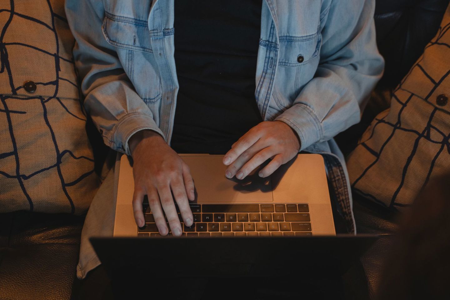 Source: images.pexels.com A close-up view of a person typing on a lapto